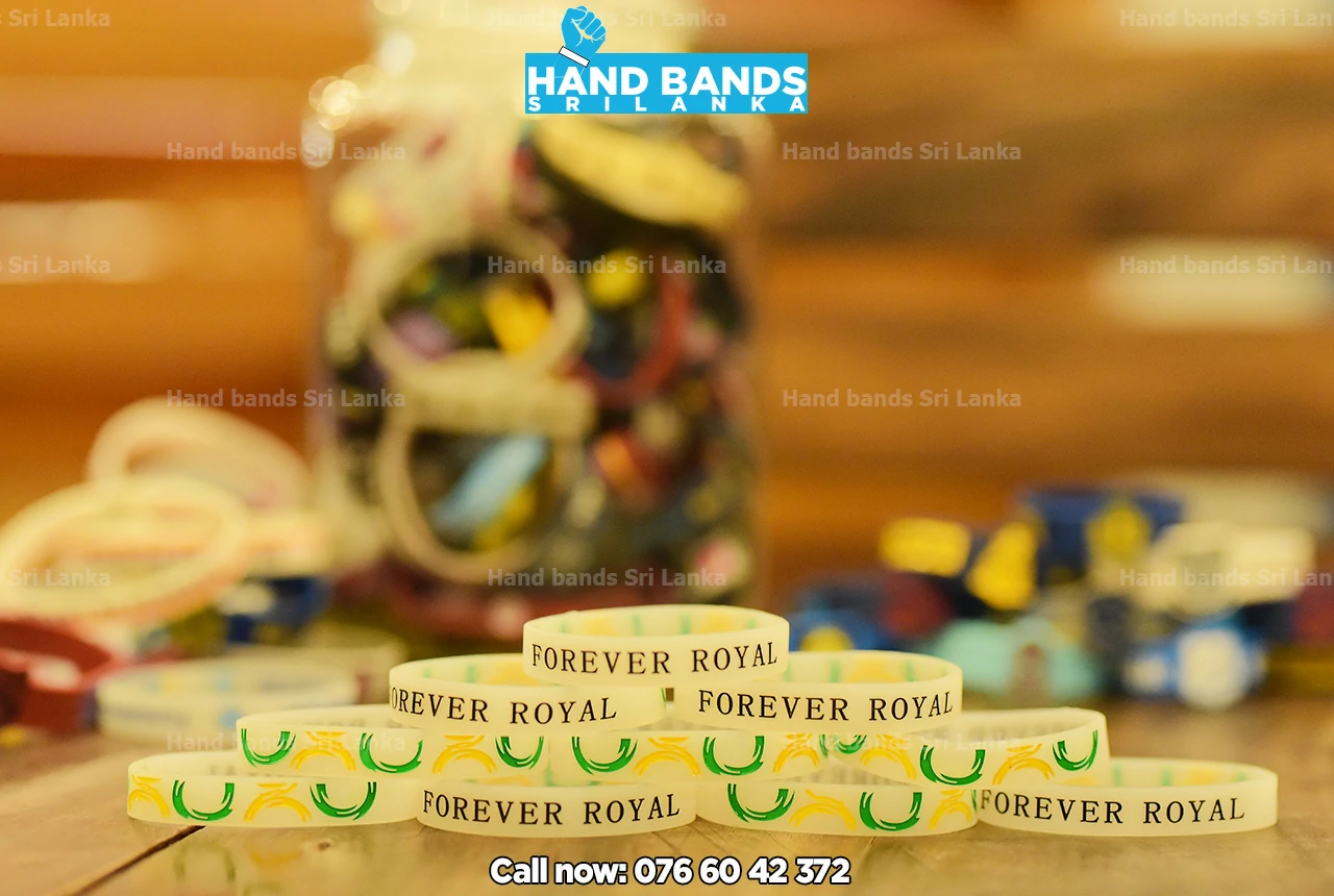 Debossed white/transparant silicone handband/wristbands, design for school bigmatch fundraising events in Sri Lanka