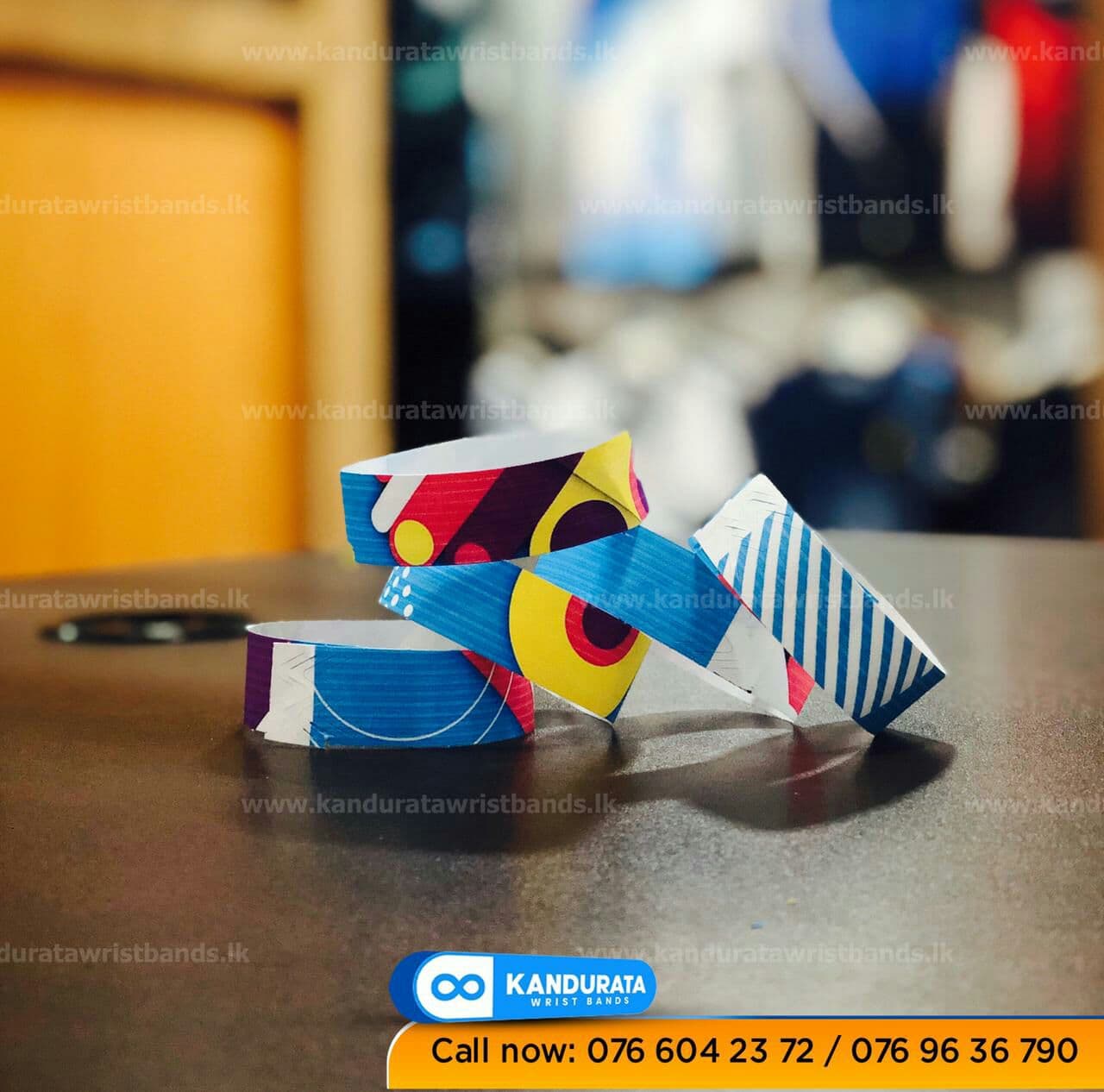 Kandurata wrist band's Debossed & Ink Filled Wristbands by identification
								wristbands.Debossed means we 'engrave' your message and logo into the band and fill the
								inks, So it lasts longer. Debossed and ink filled wristbands are made with high-quality
								silicone compound and filled with high-quality ink. You can wear this type of bands
								years without discolourations.